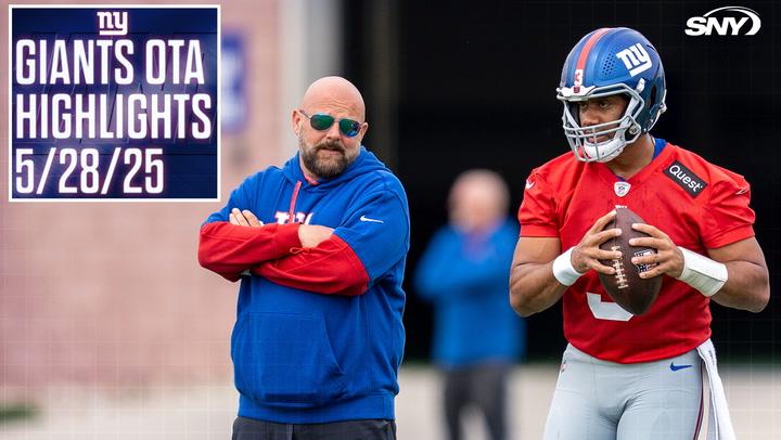 Coach and player at OTAs.