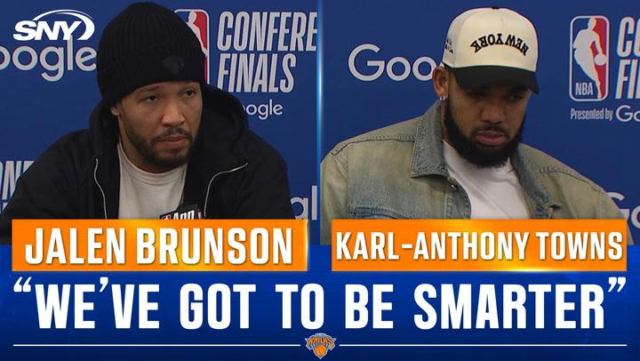 Two athletes at press conference.