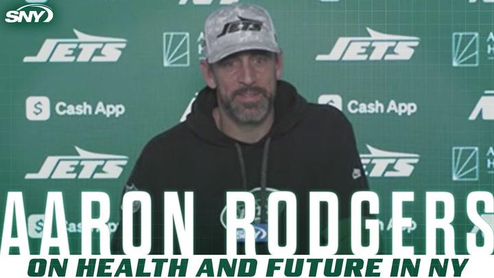 Aaron Rodgers discusses playing for the Jets next season despite MCL injury concerns.