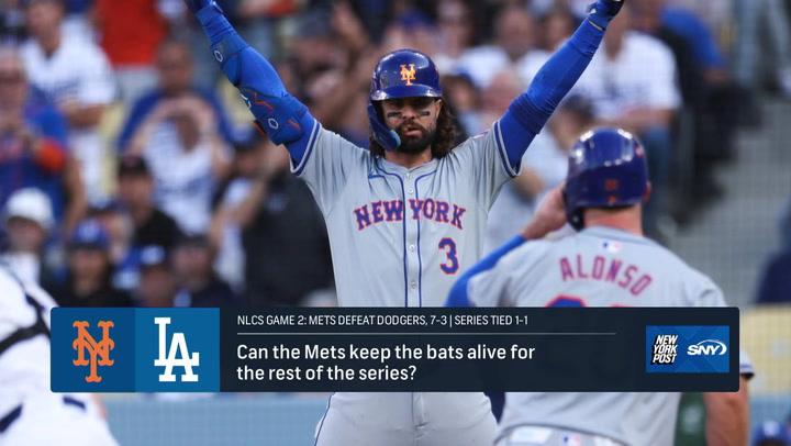 Mets players celebrate Game 2 victory against the Dodgers in the 2024 NLCS, series tied 1-1.