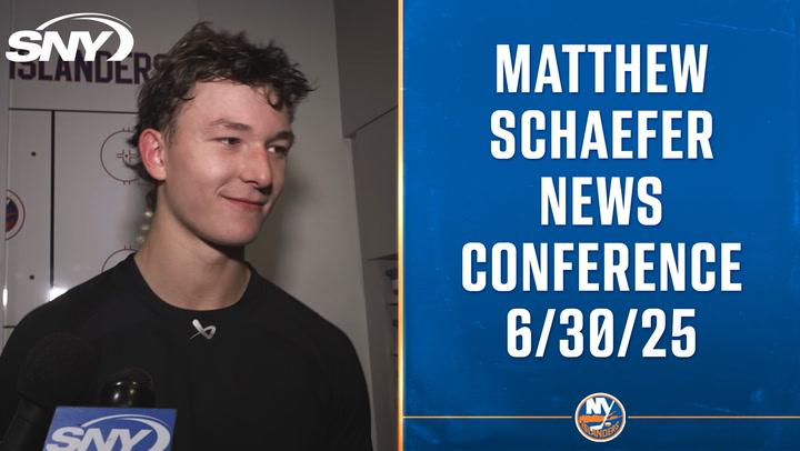 Smiling hockey player interview.