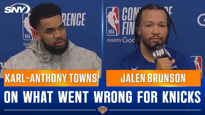 Two NBA players at press conference.