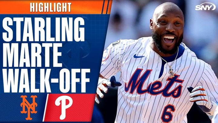 Starling Marte's walk-off hit completes Mets sweep; post-game interview excitement visible.