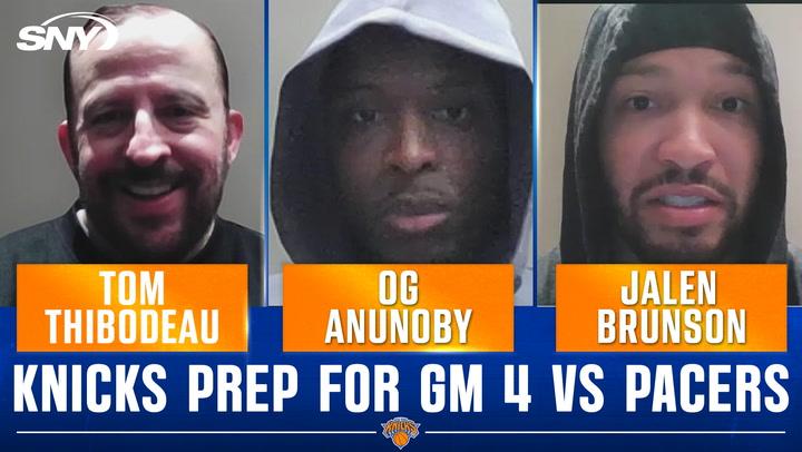 Three men discussing Knicks.