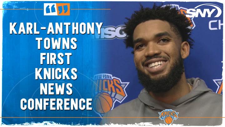 Karl-Anthony Towns smiles during his first Knicks press conference, reuniting with Thibodeau.