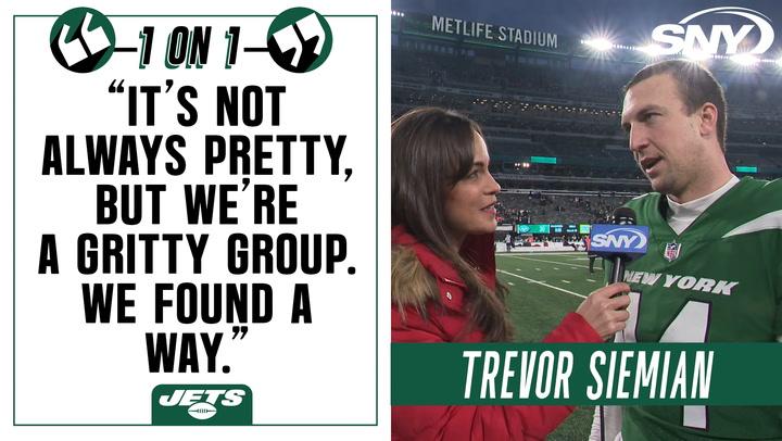 Trevor Siemian reacts to the Jets' resilient win on the field with Jeane Coakley