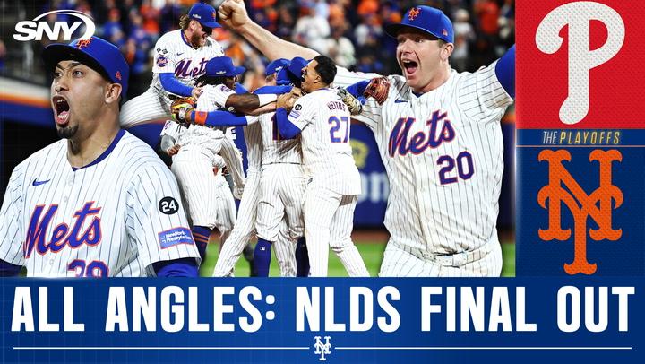 Mets players celebrate Edwin Diaz's game-winning strikeout against Phillies in NLDS Game 4.