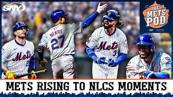 Mets players celebrating on the field. Citi Field crowd cheers, boosting NLCS performance.