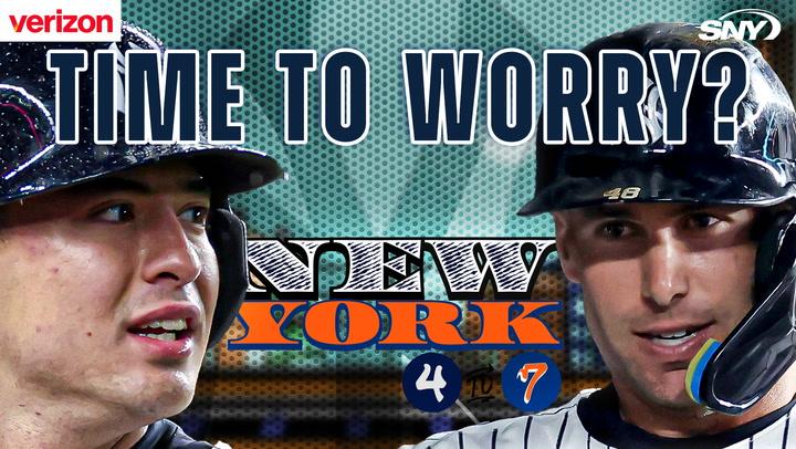 Two baseball players concerned.