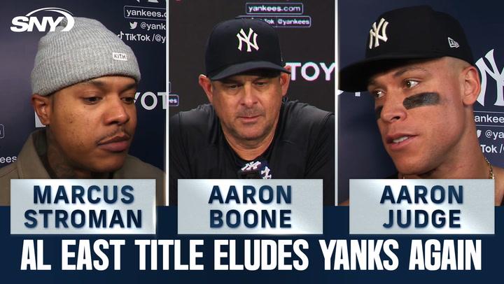 Image showing Marcus Stroman, Aaron Boone, and Aaron Judge discussing a Yankees loss and title hopes.