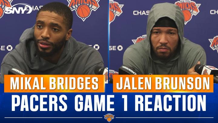 Two Knicks players at presser.