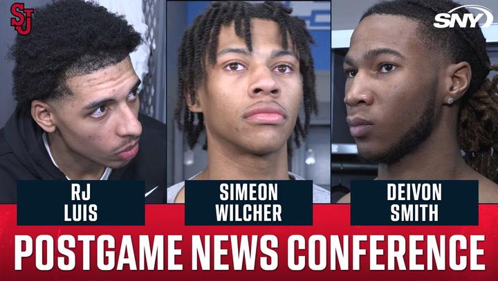 St. John's players RJ Luis, Simeon Wilcher, and Deivon Smith at postgame news conference.