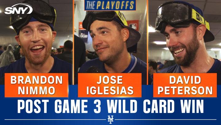 Brandon Nimmo, Jose Iglesias, and David Peterson celebrate Mets Wild Card win over Brewers.