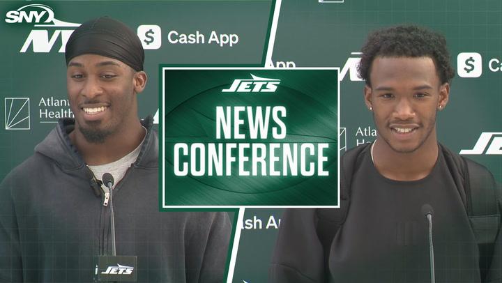 Jets WR Garrett Wilson and RB Breece Hall at a press conference for Vikings matchup in London.