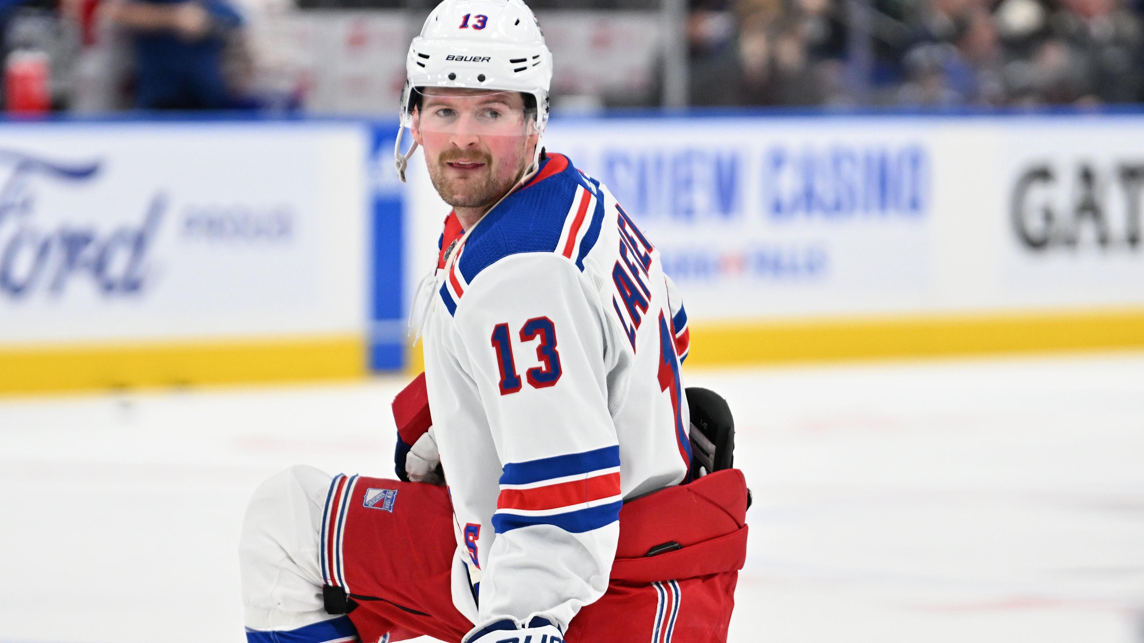 New York Rangers forward Alexis Lafreniere (13) warms up before playing the Toronto Maple Leafs at Scotiabank Arena