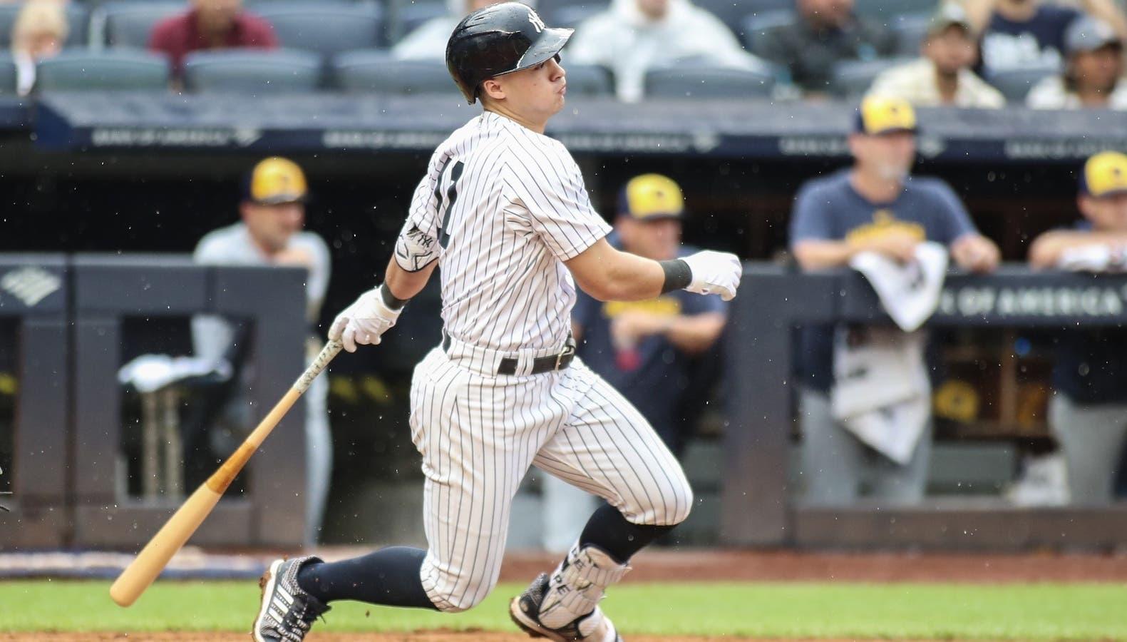 New York Yankees shortstop Anthony Volpe (11) hits an RBI single in the fourth inning against the Milwaukee Brewers at Yankee Stadium. / Wendell Cruz-USA TODAY Sports