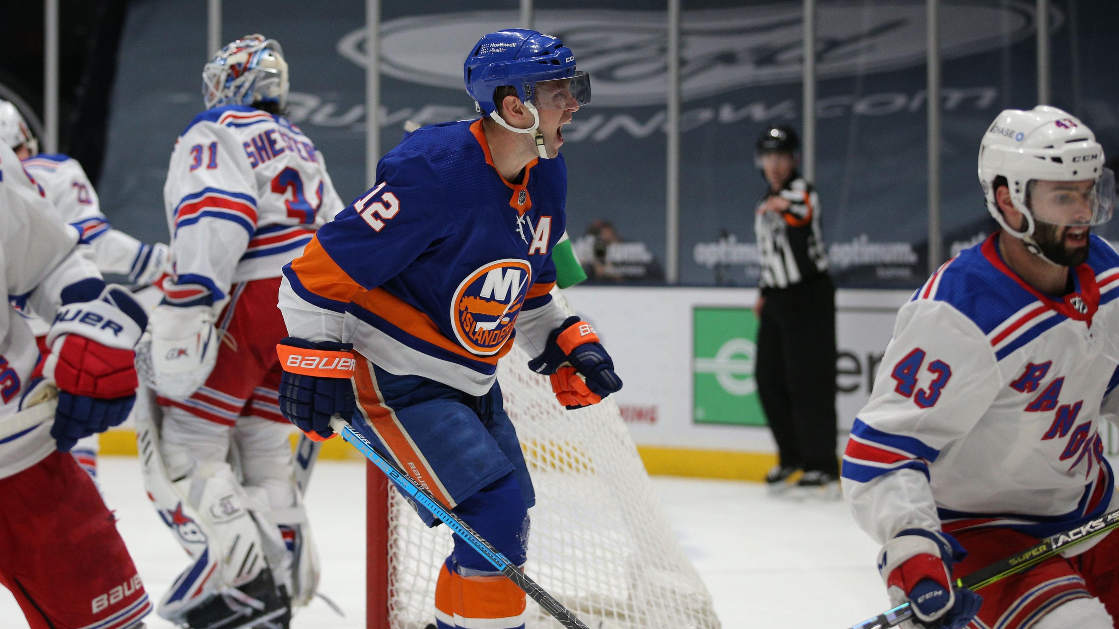 Apr 20, 2021; Uniondale, New York, USA; New York Islanders center Josh Bailey (12) celebrates after scoring a goal against New York Rangers goalie Igor Shesterkin (31) during the first period at Nassau Veterans Memorial Coliseum. / Brad Penner-USA TODAY Sports