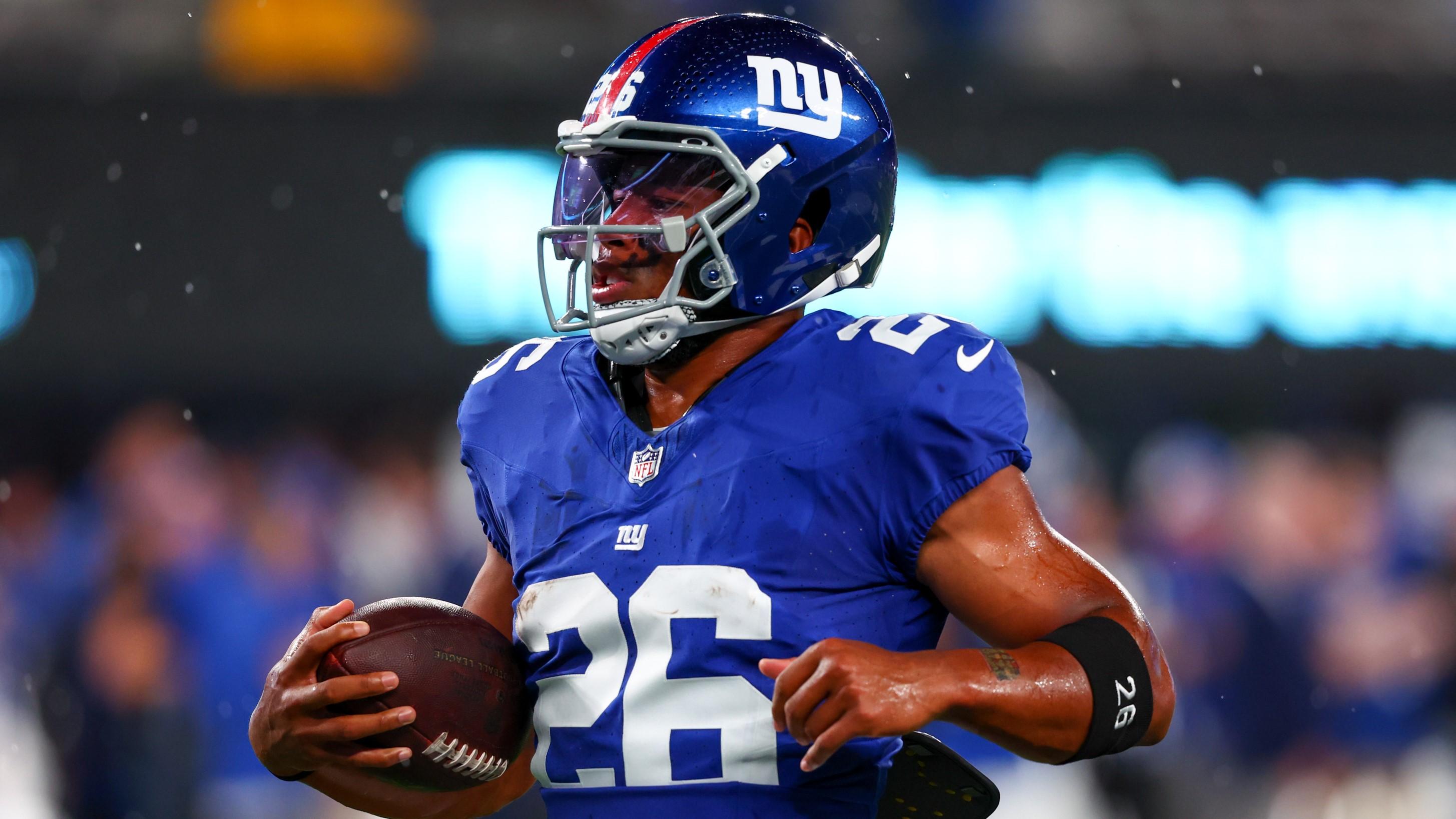 Sep 10, 2023; East Rutherford, New Jersey, USA; New York Giants running back Saquon Barkley (26) runs with the ball during warmups for their game against the Dallas Cowboys at MetLife Stadium. Mandatory Credit: Ed Mulholland-USA TODAY Sports