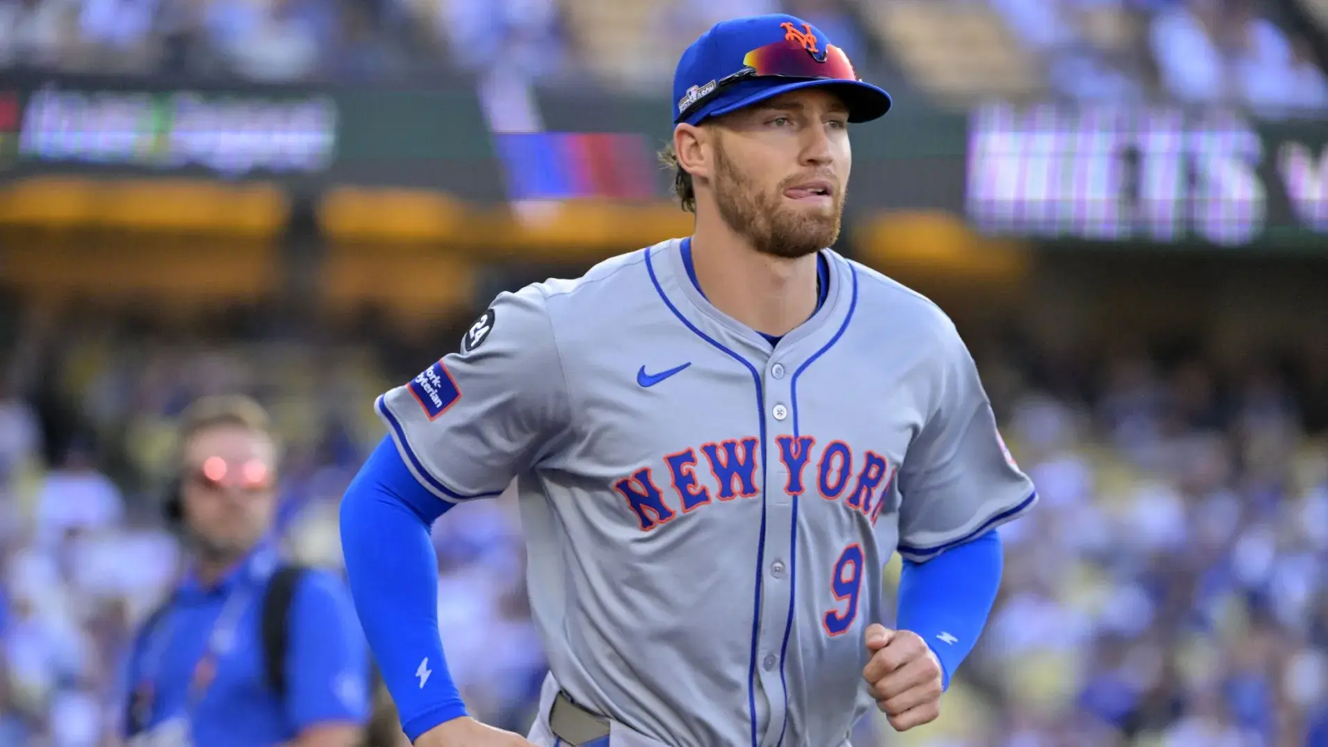 New York Mets outfielder Brandon Nimmo (9) takes the field before game one of the NLCS for the 2024 MLB Playoffs at Dodger Stadium. / Jayne Kamin-Oncea-Imagn Images