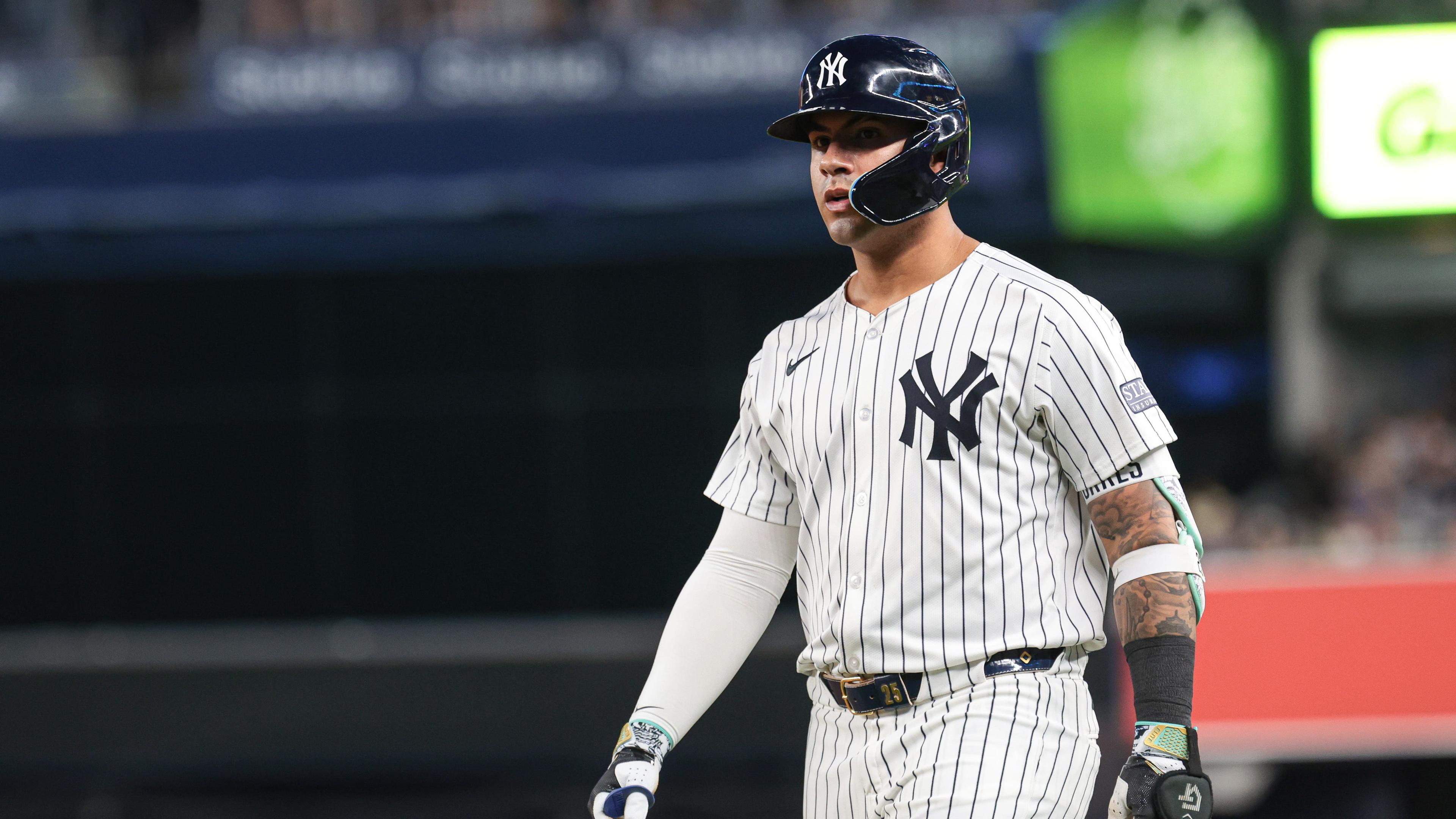 New York Yankees second baseman Gleyber Torres (25) reacts after safely reaching first base on an infield single during the fourth inning against the Boston Red Sox at Yankee Stadium. Torres would leave the game with an injury after the play. / Vincent Carchietta-USA TODAY Sports