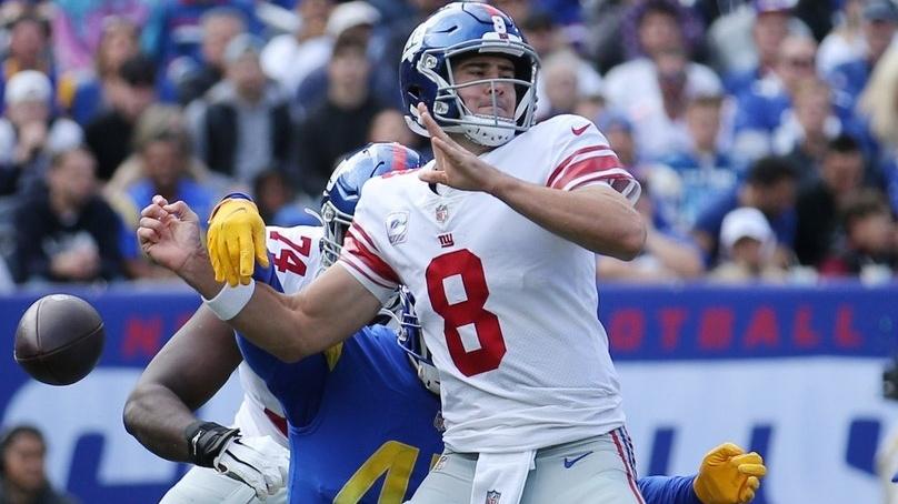 Oct 17, 2021; East Rutherford, New Jersey, USA; Los Angeles Rams linebacker Obo Okoronkwo (45) strips the ball from New York Giants quarterback Daniel Jones (8) during the second quarter at MetLife Stadium