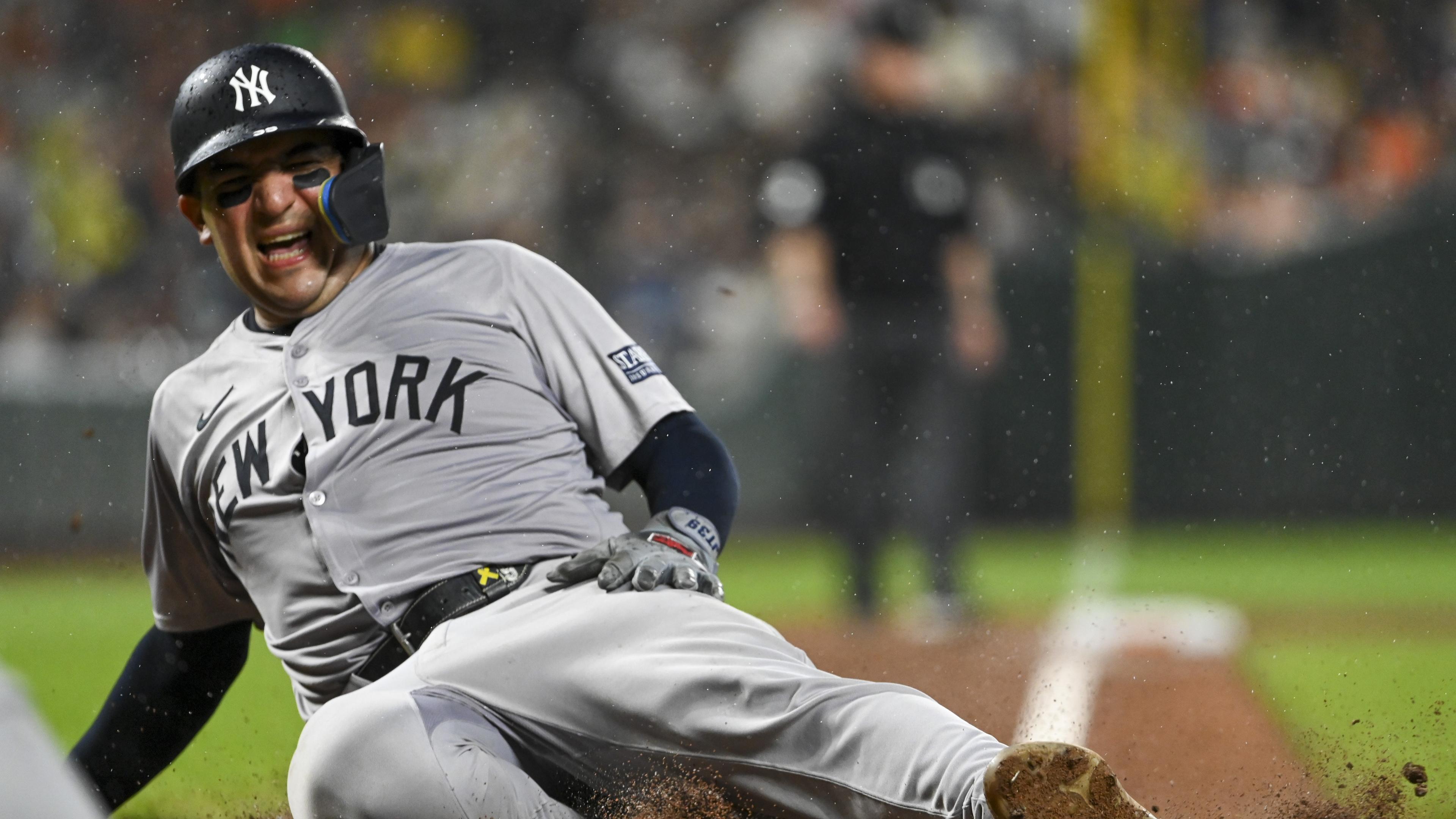 Jul 12, 2024; Baltimore, Maryland, USA; New York Yankees catcher Jose Trevino (39) slides to score in the ninth inning against the Baltimore Orioles at Oriole Park at Camden Yards. Mandatory Credit: Tommy Gilligan-USA TODAY Sports