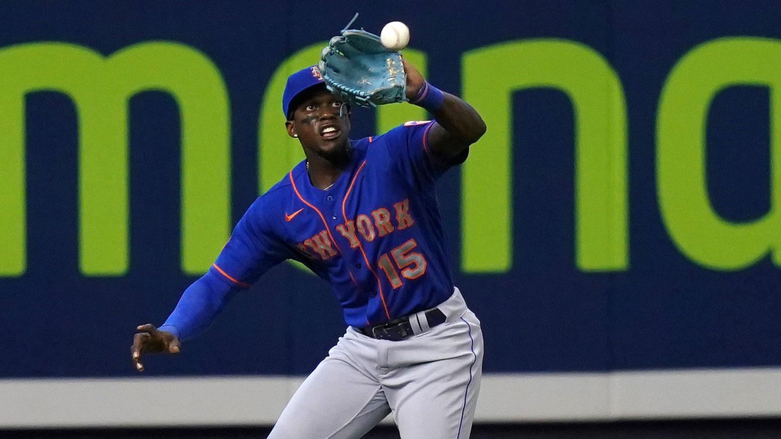 May 23, 2021; Miami, Florida, USA; New York Mets left fielder Cameron Maybin (15) catches the fly ball hit by Miami Marlins first baseman Jesus Aguilar (24, not pictured) in the 1st inning at loanDepot park.