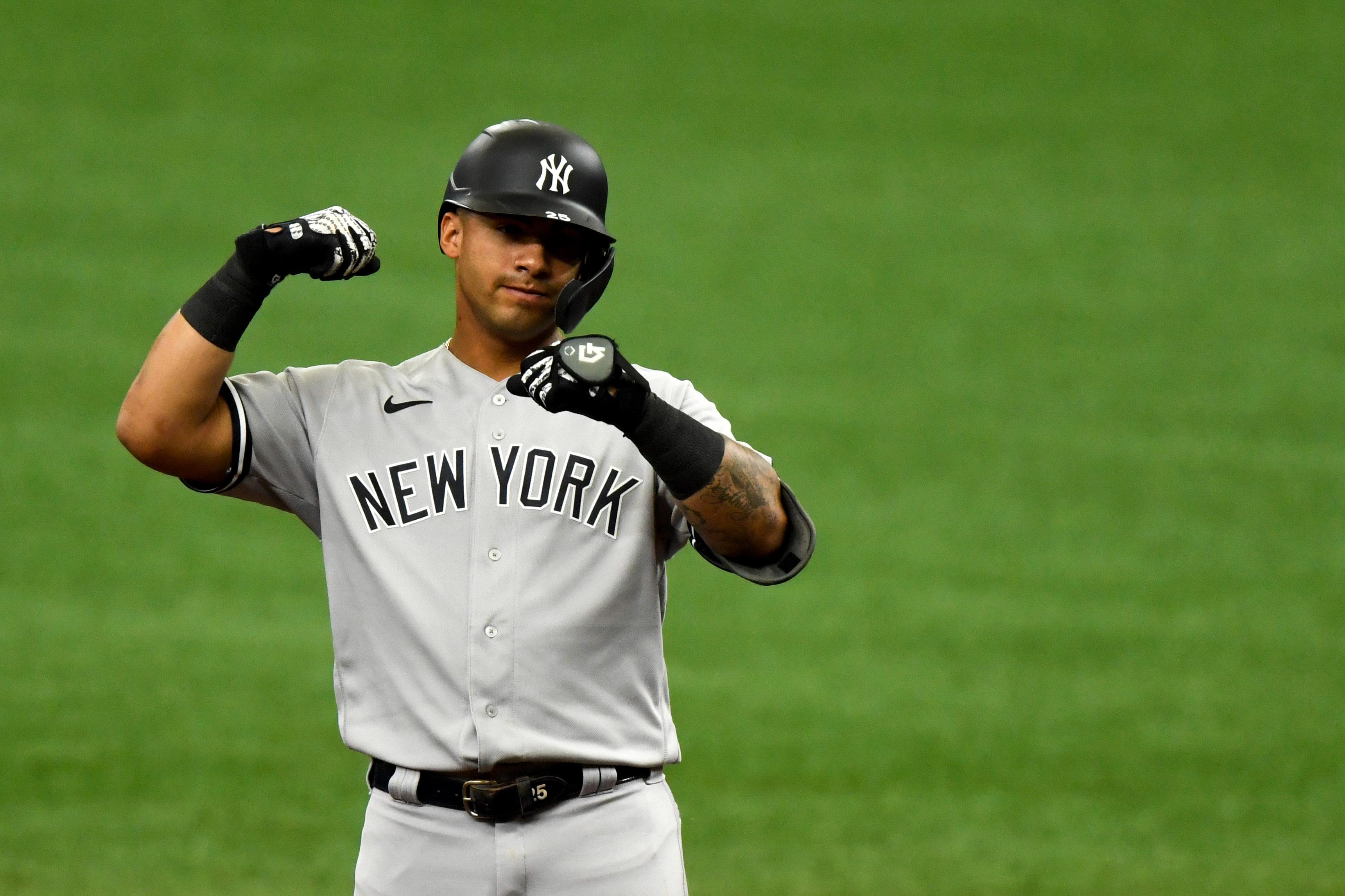 Aug 9, 2020; St. Petersburg, Florida, USA; New York Yankees second baseman Gleyber Torres (25) reacts after hitting a double during the fifth inning against the Tampa Bay Rays at Tropicana Field. Mandatory Credit: Douglas DeFelice-USA TODAY Sports