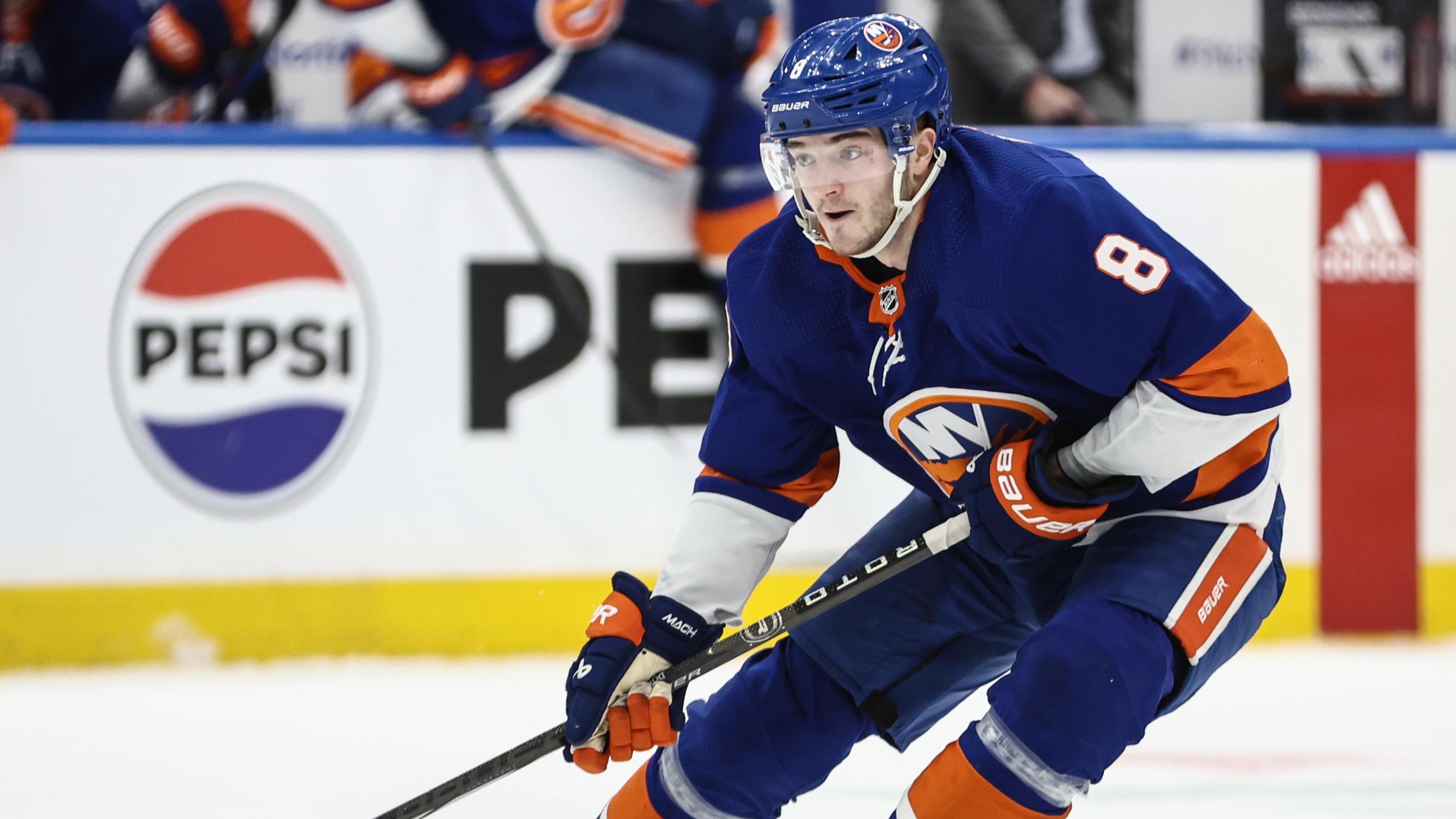 New York Islanders defenseman Noah Dobson (8) controls the puck in the second period against the Carolina Hurricanes in game four of the first round of the 2024 Stanley Cup Playoffs at UBS Arena