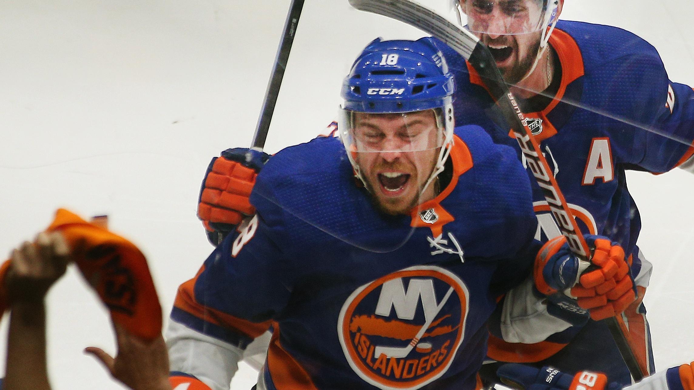 Jun 23, 2021; Uniondale, New York, USA; New York Islanders left wing Anthony Beauvillier (18) reacts after scoring the game winning goal against the Tampa Bay Lightning during overtime in game six of the 2021 Stanley Cup Semifinals at Nassau Veterans Memorial Coliseum. Mandatory Credit: Andy Marlin-USA TODAY Sports