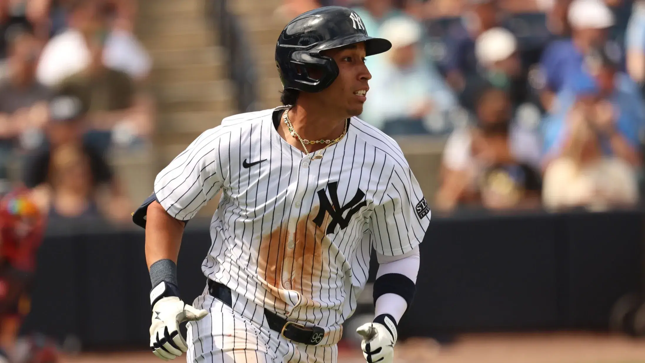 Mar 10, 2024; Tampa, Florida, USA; New York Yankees infielder Oswaldo Cabrera (95) hits a single against the Atlanta Braves during the fifth inning at George M. Steinbrenner Field. / Kim Klement Neitzel-USA TODAY Sports