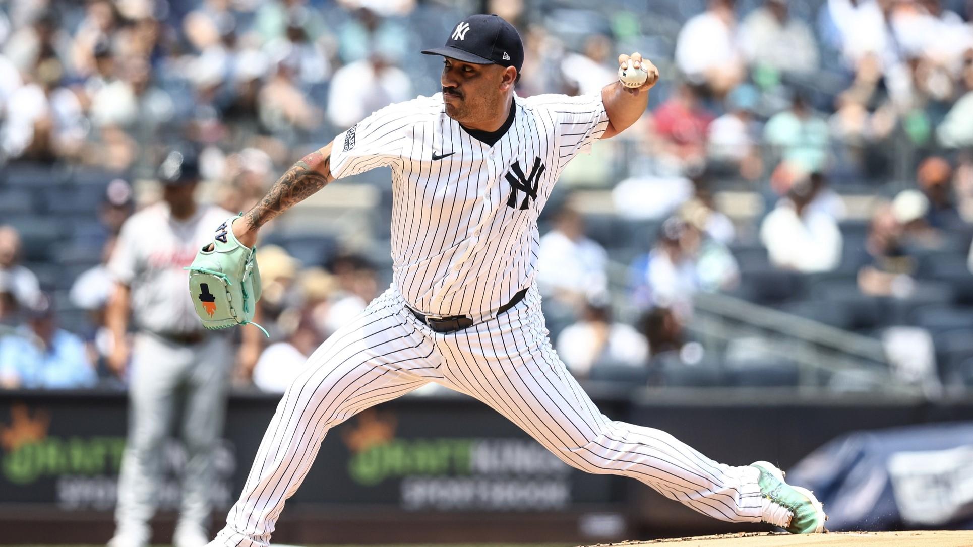 Jun 23, 2024; Bronx, New York, USA; New York Yankees starting pitcher Nestor Cortes (65) pitches in the first inning against the Atlanta Braves at Yankee Stadium.