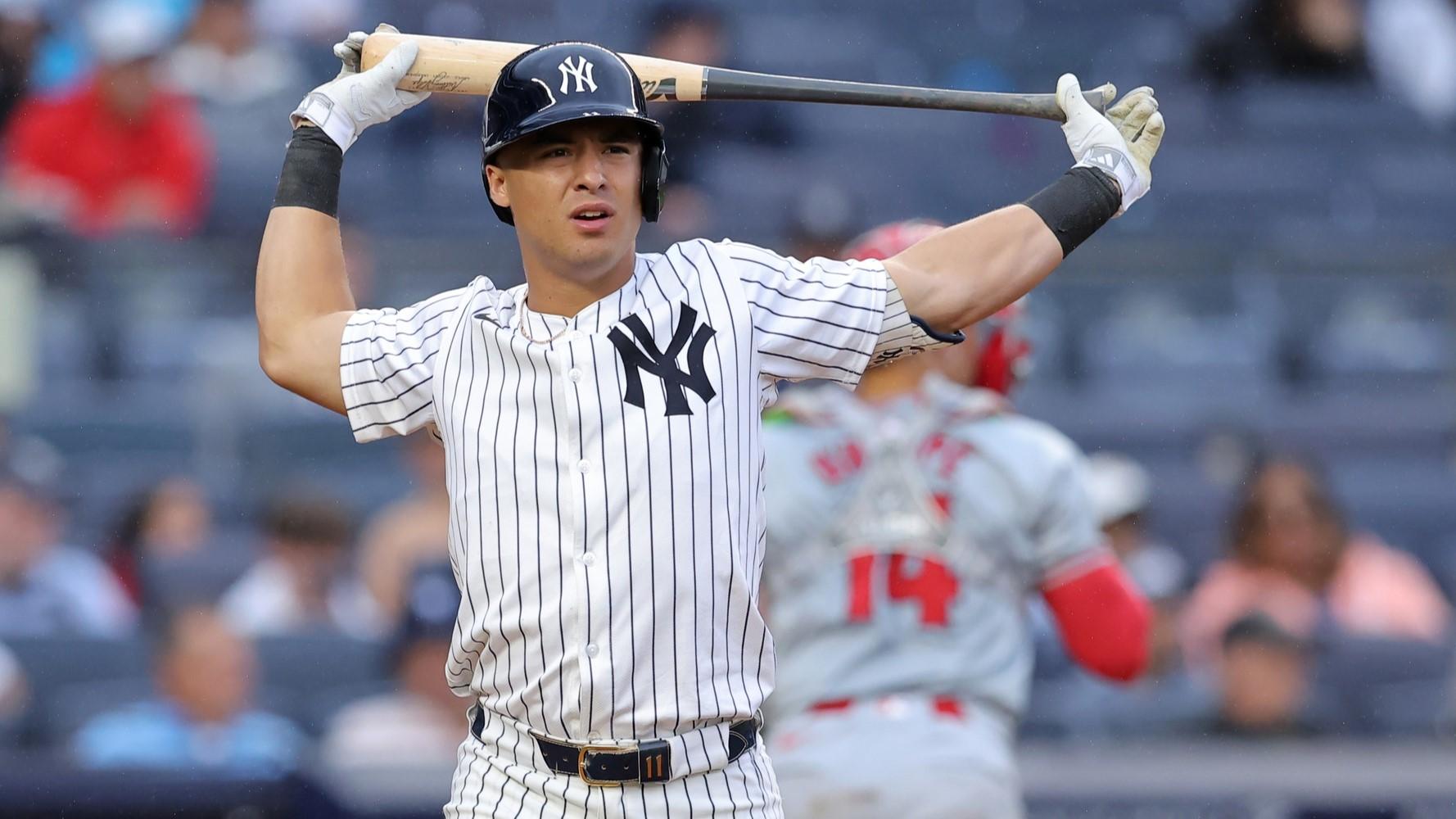 Aug 7, 2024; Bronx, New York, USA; New York Yankees shortstop Anthony Volpe (11) reacts after striking out to end the sixth inning against the Los Angeles Angels at Yankee Stadium. 