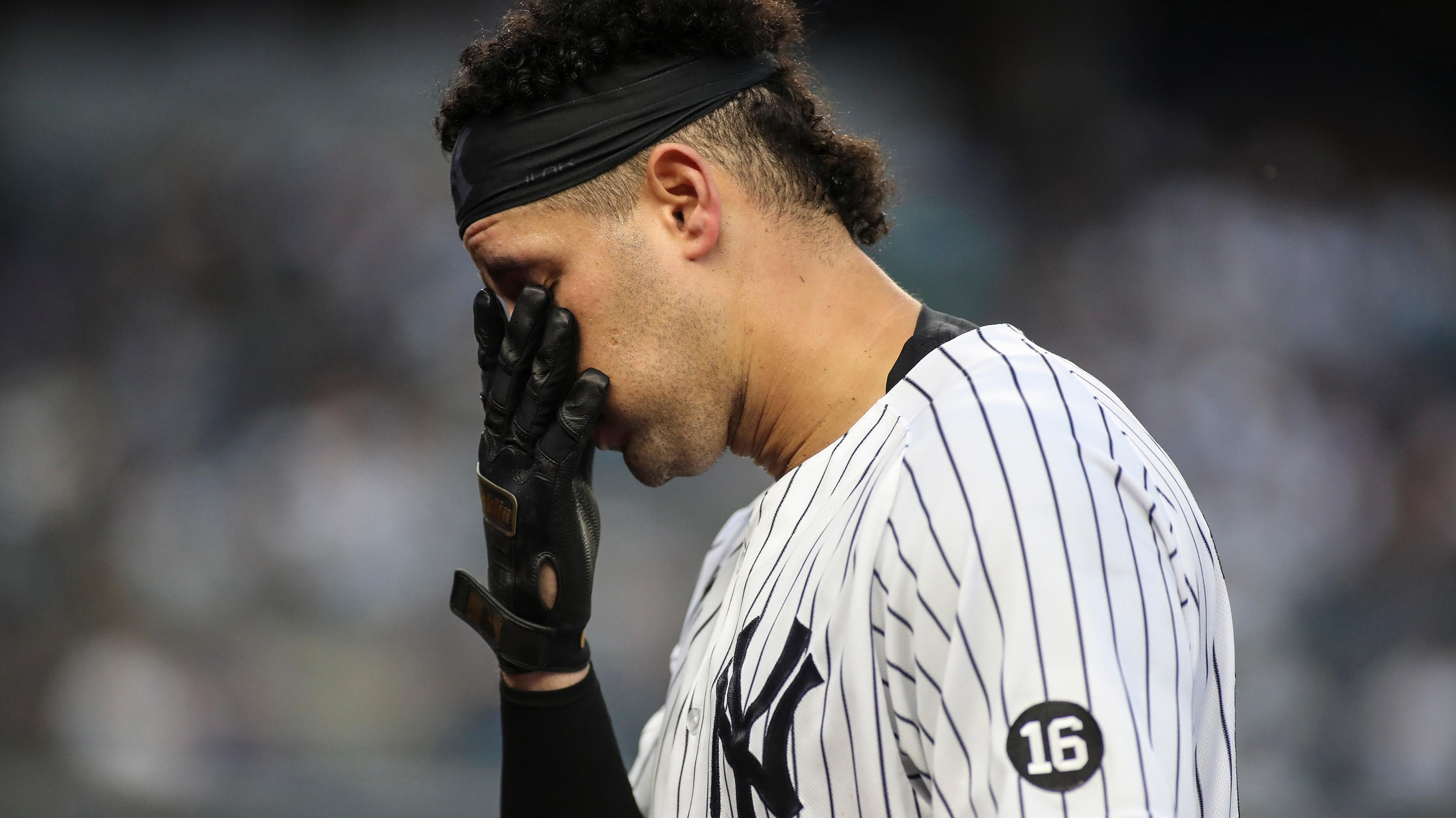 New York Yankees catcher Gary Sanchez (24) walks back to the dugout after grounding out in the eighth inning against the Baltimore Orioles at Yankee Stadium.