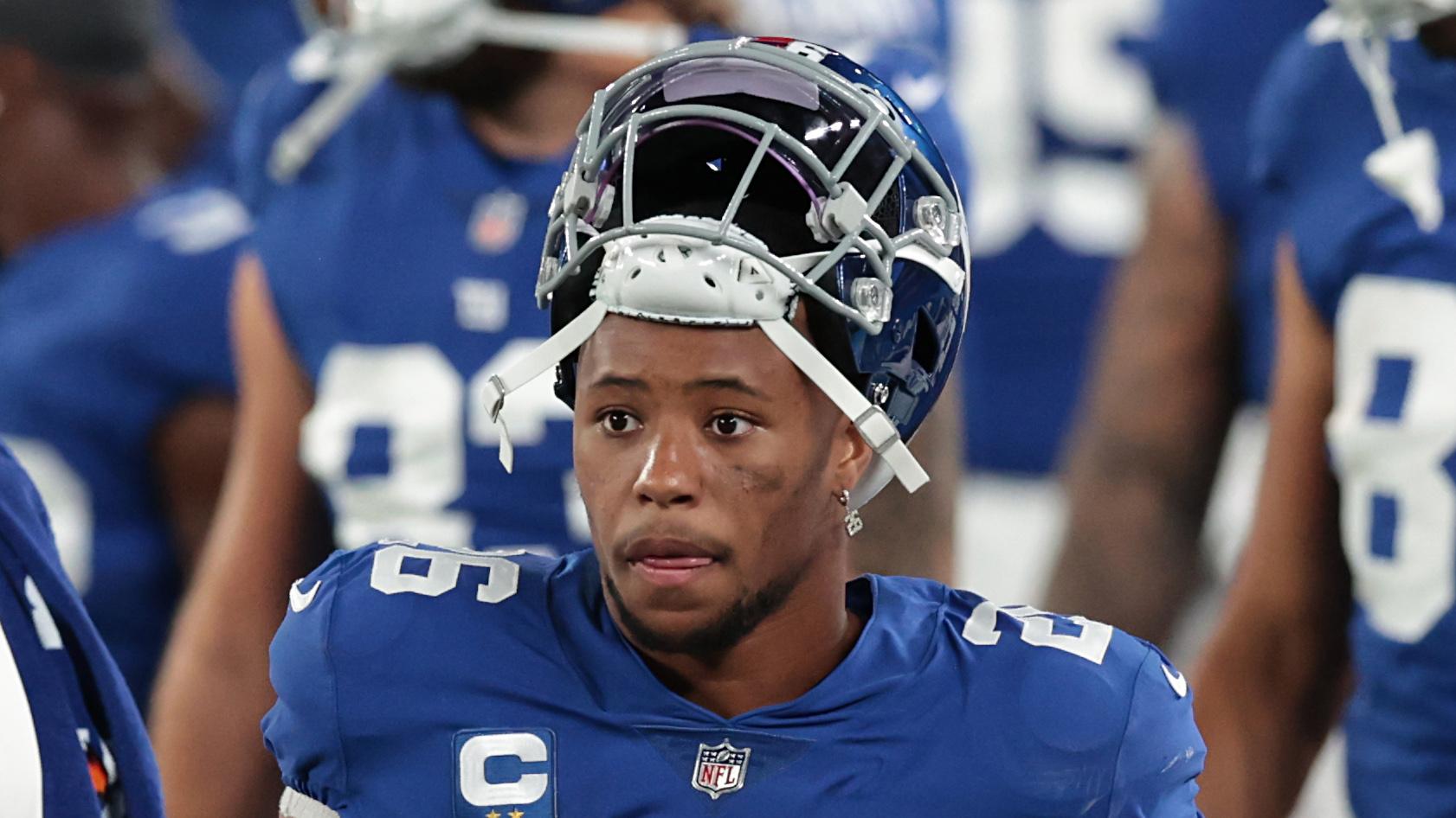 New York Giants running back Saquon Barkley (26) looks on during the first half against the Pittsburgh Steelers at MetLife Stadium.