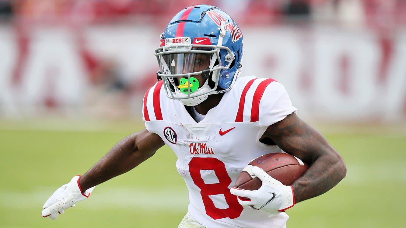 Oct 17, 2020; Fayetteville, Arkansas, USA; Ole Miss Rebels wide receiver Elijah Moore (8) runs after a catch against the Arkansas Razorbacks at Donald W. Reynolds Razorback Stadium. Arkansa won 33-21. / Nelson Chenault-USA TODAY Sports