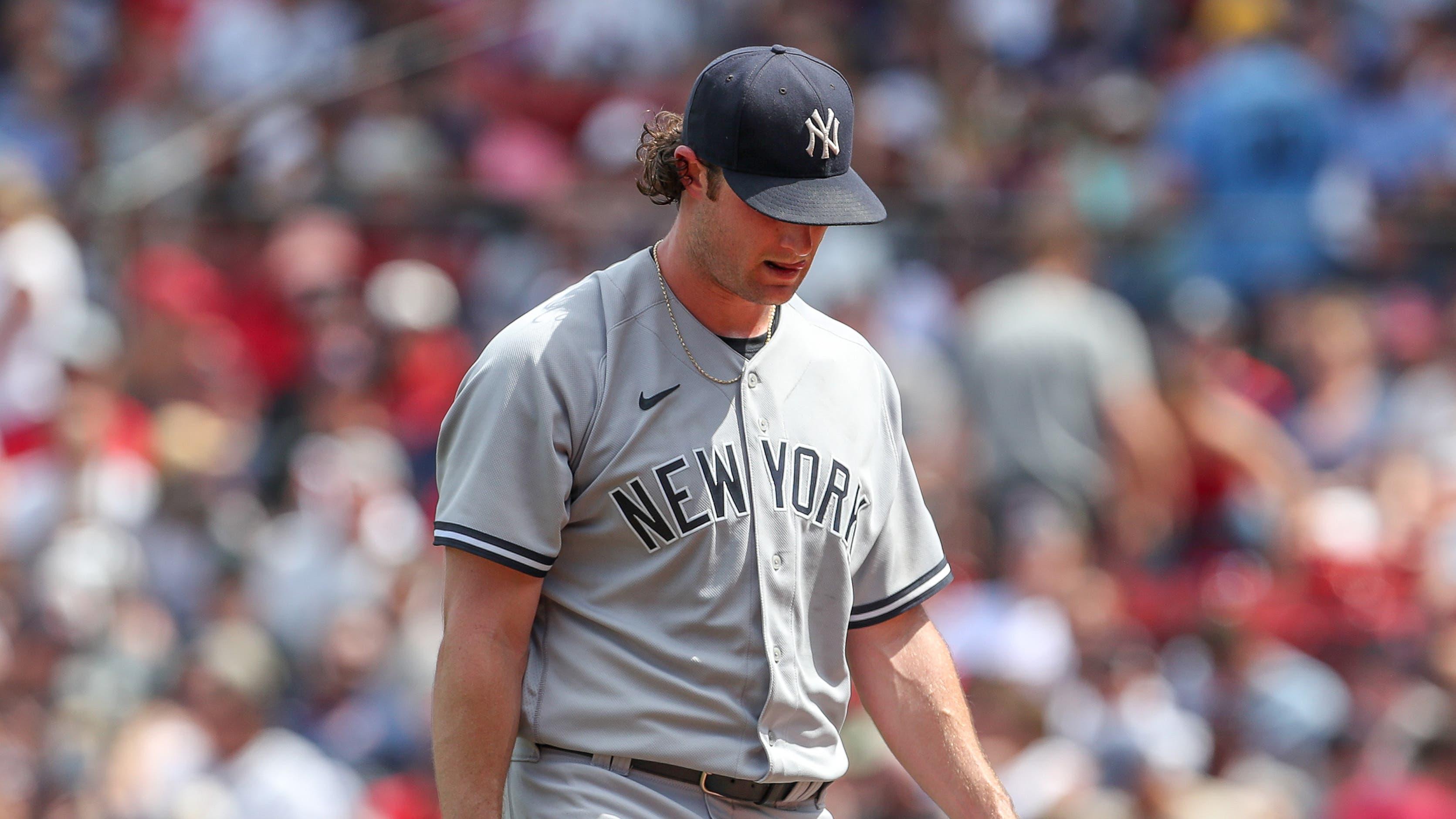 New York Yankees starting pitcher Gerrit Cole (45) reacts during the fourth inning against the Boston Red Sox at Fenway Park. / Paul Rutherford - USA TODAY Sports