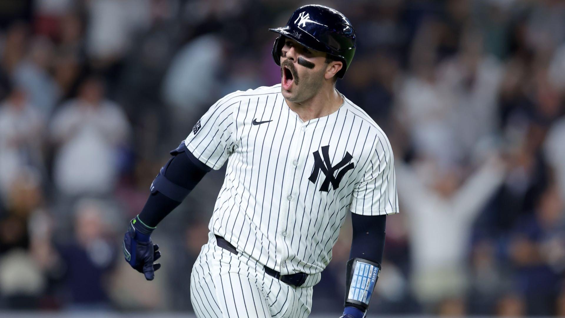 Sep 9, 2024; Bronx, New York, USA; New York Yankees catcher Austin Wells (28) reacts as he rounds the bases after hitting a three run home run against the Kansas City Royals during the seventh inning at Yankee Stadium. 