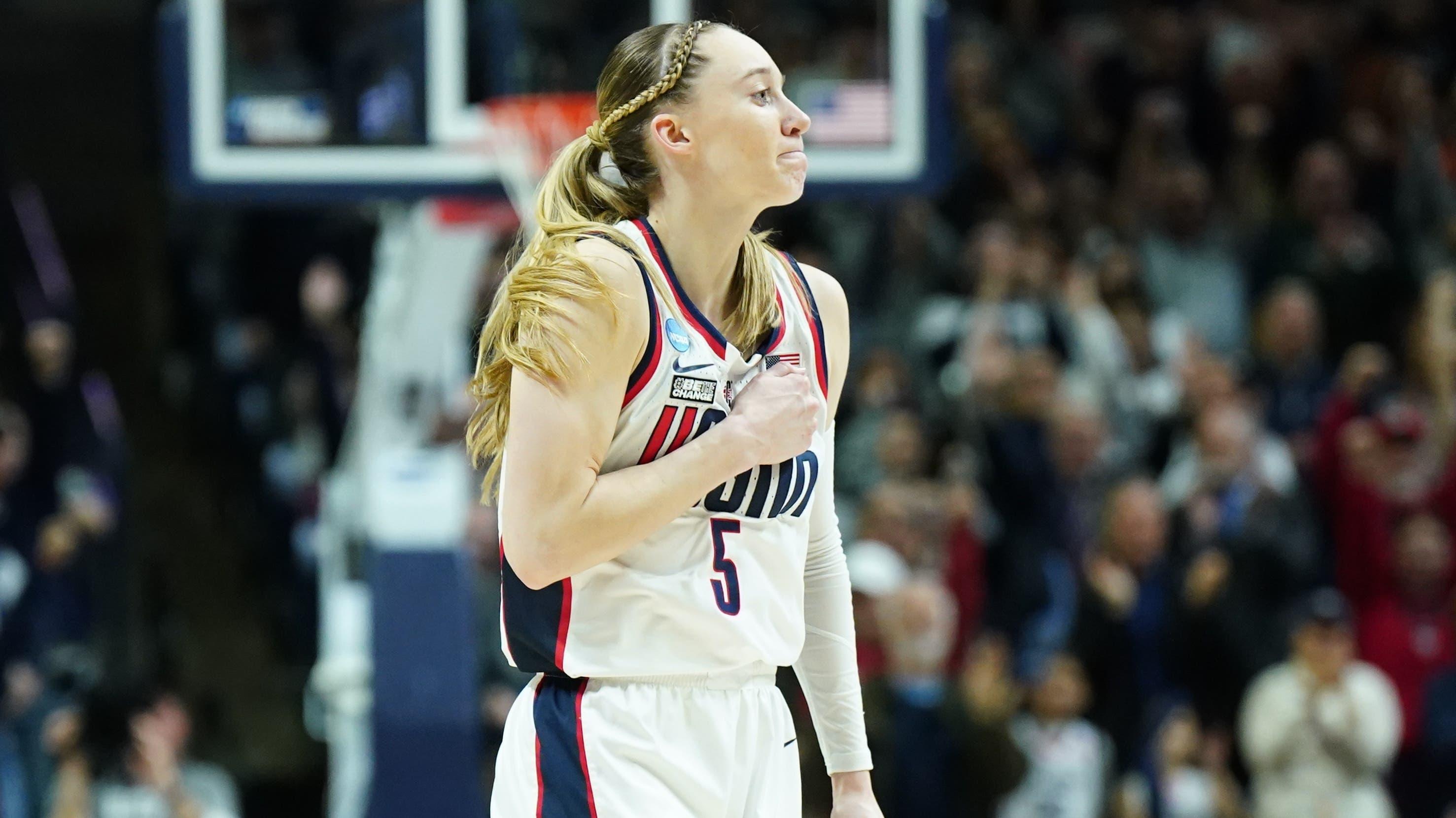 UConn Huskies guard Paige Bueckers (5) reacts after her basket against the Syracuse Orange in the first half at Harry A. Gampel Pavilion