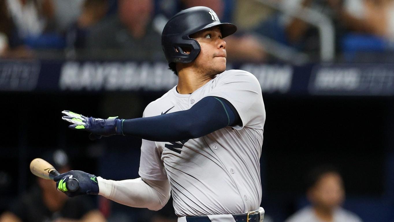 New York Yankees outfielder Juan Soto (22) hits a solo home run against the Tampa Bay Rays in the third inning at Tropicana Field.