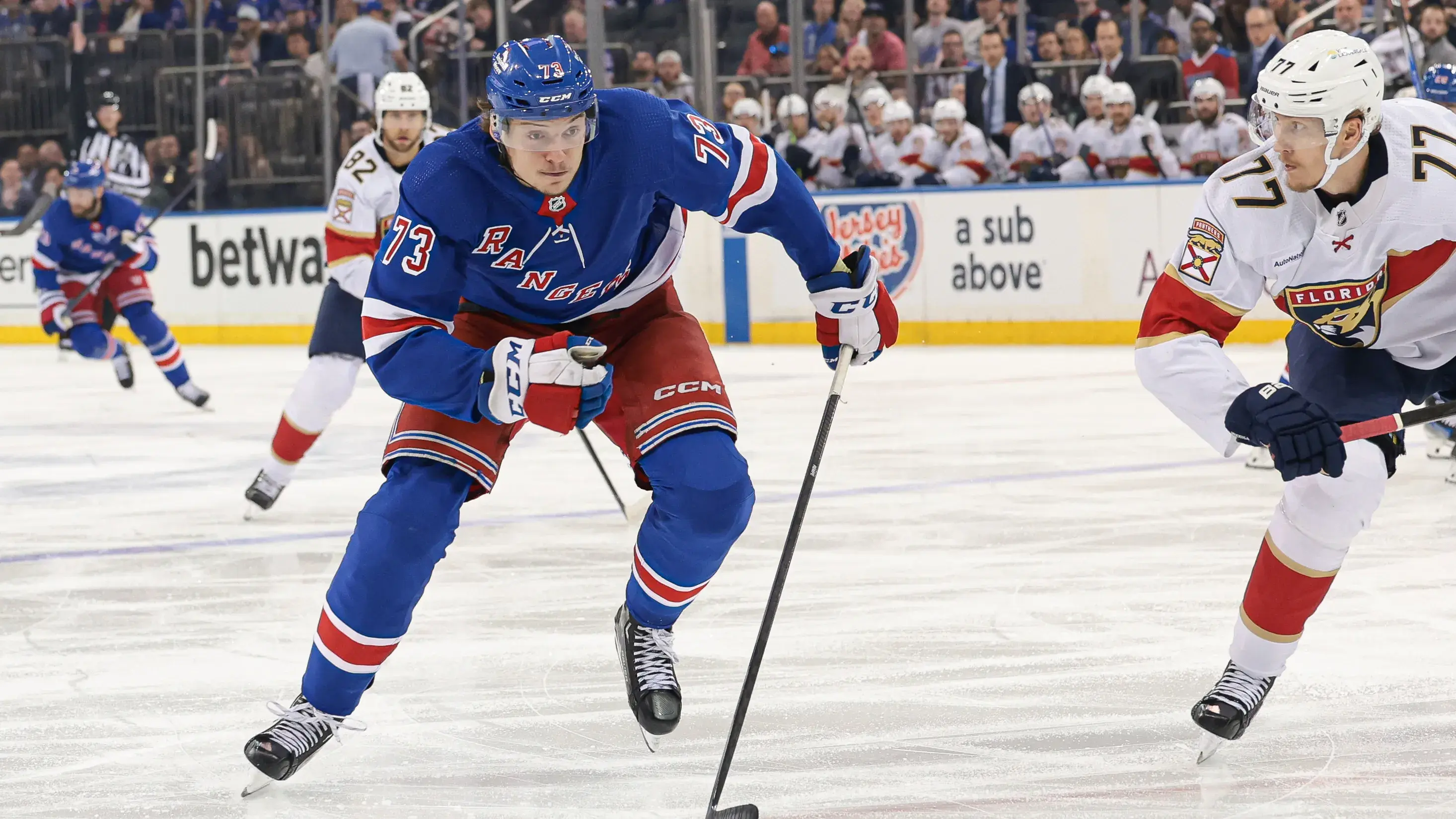 New York Rangers center Matt Rempe (73) skates up ice as Florida Panthers defenseman Niko Mikkola (77) defends during the second period in game two of the Eastern Conference Final of the 2024 Stanley Cup Playoffs at Madison Square Garden. / Vincent Carchietta-USA TODAY Sports