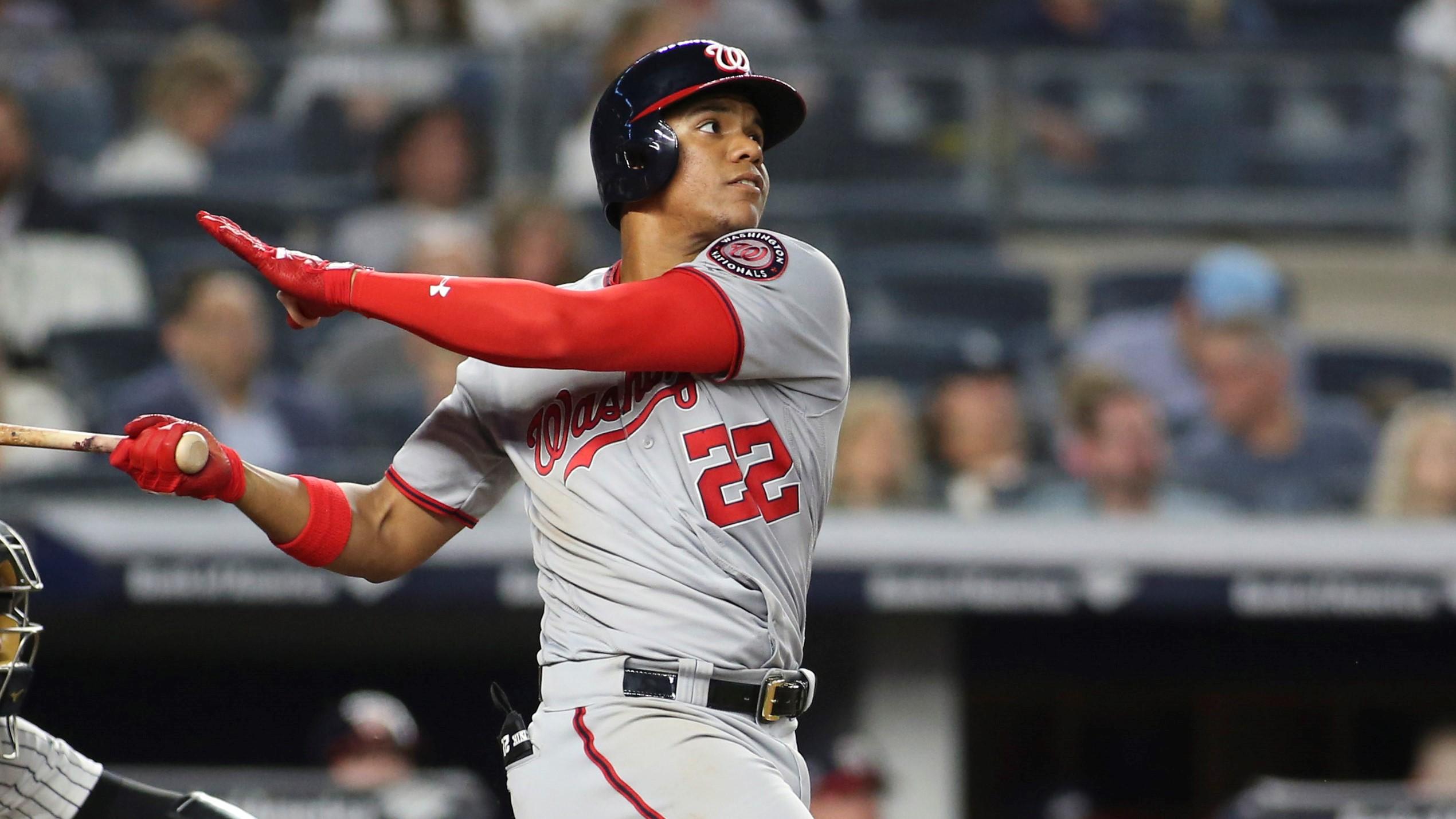 Jun 13, 2018; Bronx, NY, USA; Washington Nationals left fielder Juan Soto (22) hits a home run in the seventh inning against the New York Yankees at Yankee Stadium. Mandatory Credit: Wendell Cruz-USA TODAY Sports