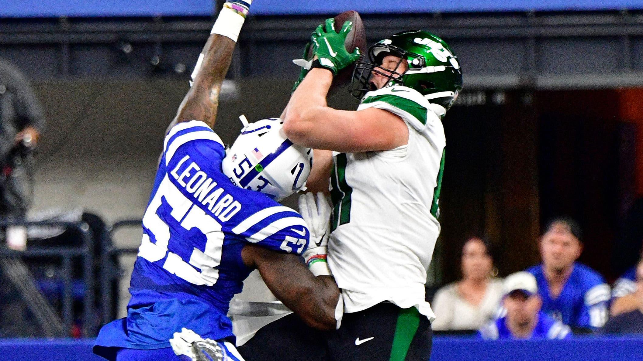 New York Jets tight end Tyler Kroft (81) catches a pass in front of Indianapolis Colts outside linebacker Darius Leonard (53) during second quarter at Lucas Oil Stadium. / Marc Lebryk-USA TODAY Sports