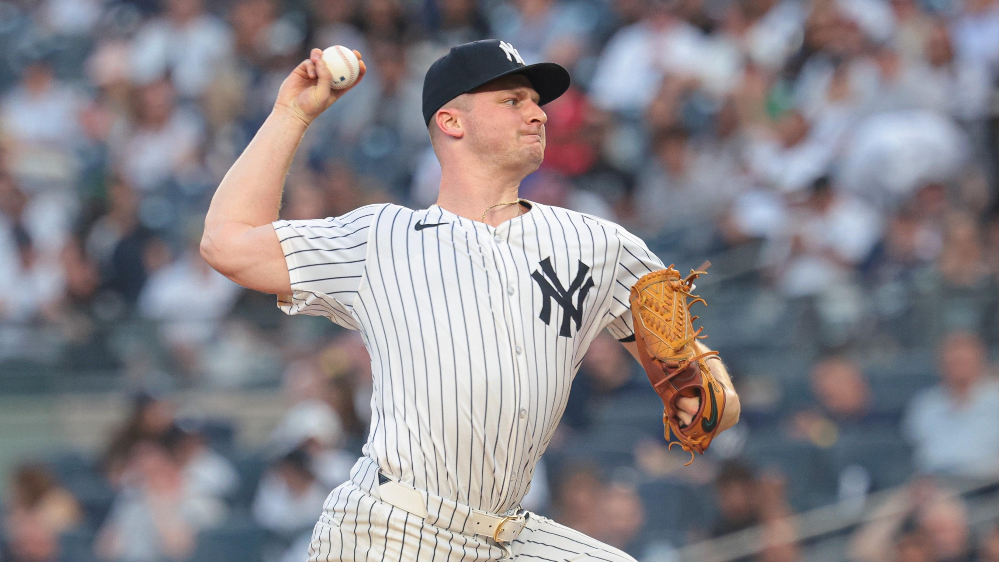 May 21, 2024; Bronx, New York, USA; New York Yankees starting pitcher Clarke Schmidt (36) delivers a pitch during the third inning against the Seattle Mariners at Yankee Stadium. Mandatory Credit: Vincent Carchietta-USA TODAY Sports