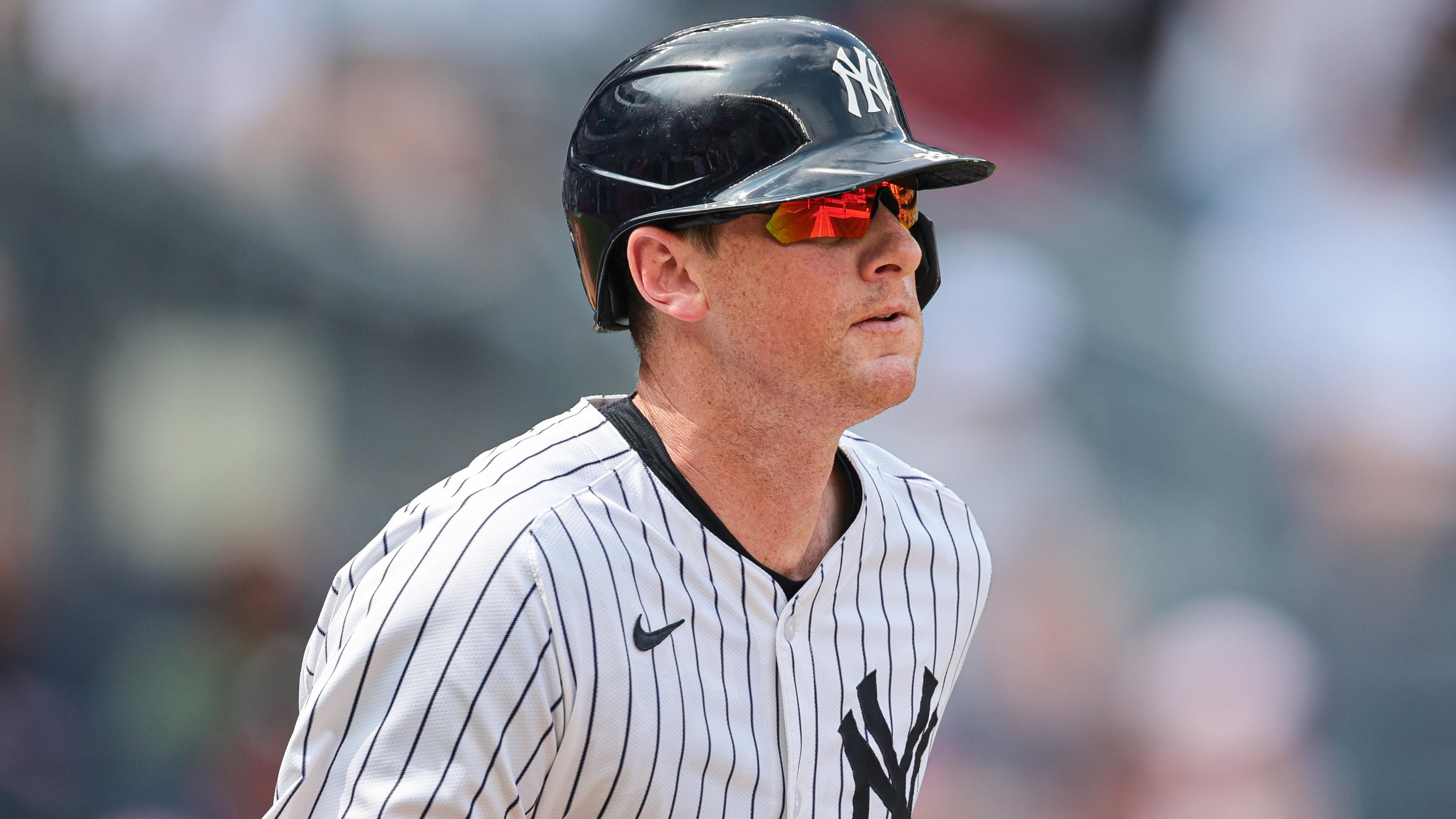 New York Yankees third baseman DJ LeMahieu (26) runs to first during his RBI single during the seventh inning against the Boston Red Sox at Yankee Stadium