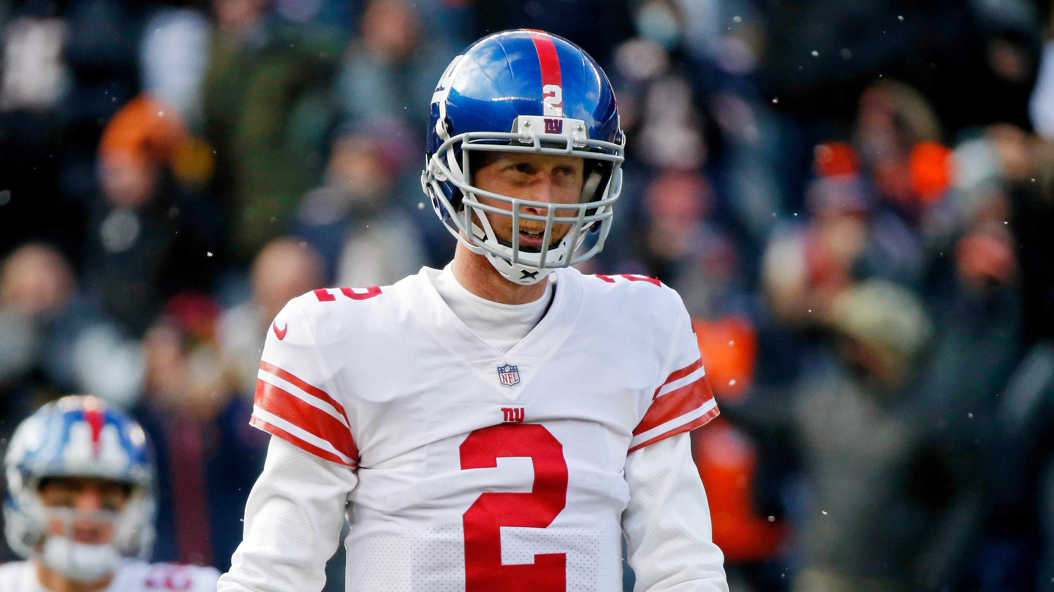 Jan 2, 2022; Chicago, Illinois, USA; New York Giants quarterback Mike Glennon (2) reacts after turning over the ball against the Chicago Bears on a fumble during the first half at Soldier Field. Mandatory Credit: Jon Durr-USA TODAY Sports