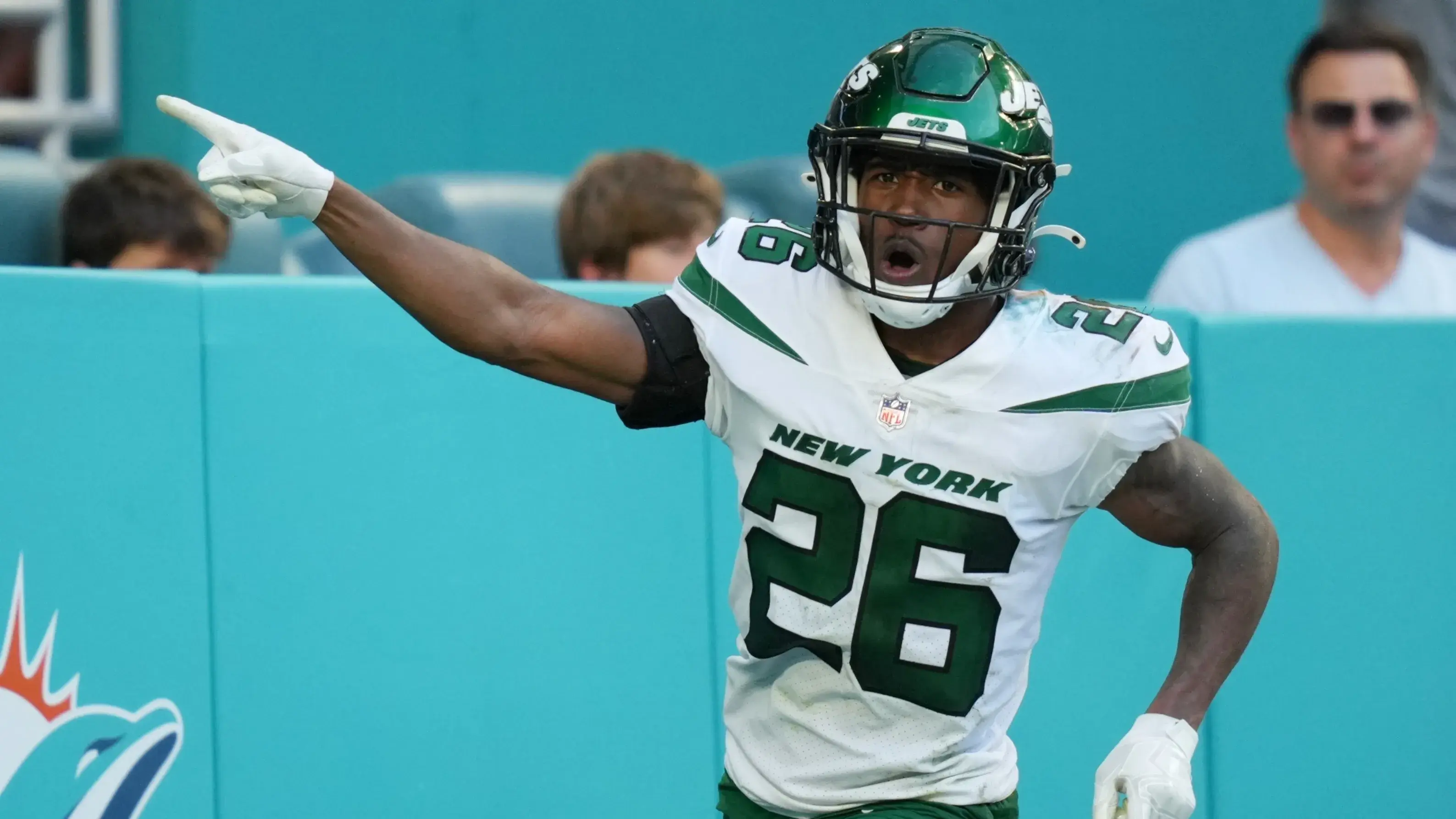 Dec 19, 2021; Miami Gardens, Florida, USA; New York Jets cornerback Brandin Echols (26) celebrates his interception that was run back for a touchdown agains the Miami Dolphins during the second half at Hard Rock Stadium. Mandatory Credit: Jasen Vinlove-USA TODAY Sports / Jasen Vinlove-USA TODAY Sports