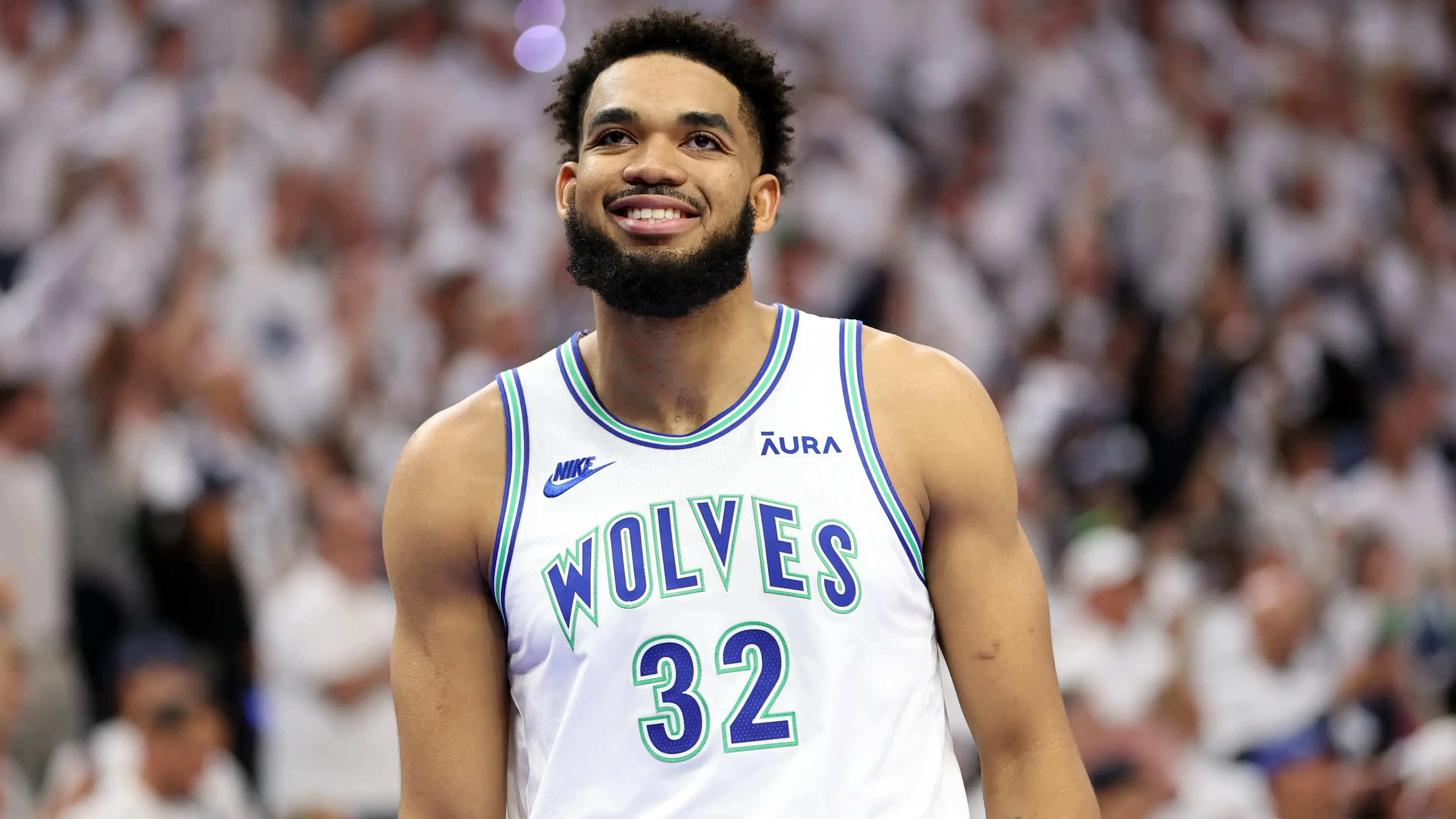 Minnesota Timberwolves center Karl-Anthony Towns (32) reacts in the first quarter against the Dallas Mavericks during game one of the western conference finals for the 2024 NBA playoffs at Target Center / Jesse Johnson - Imagn Images