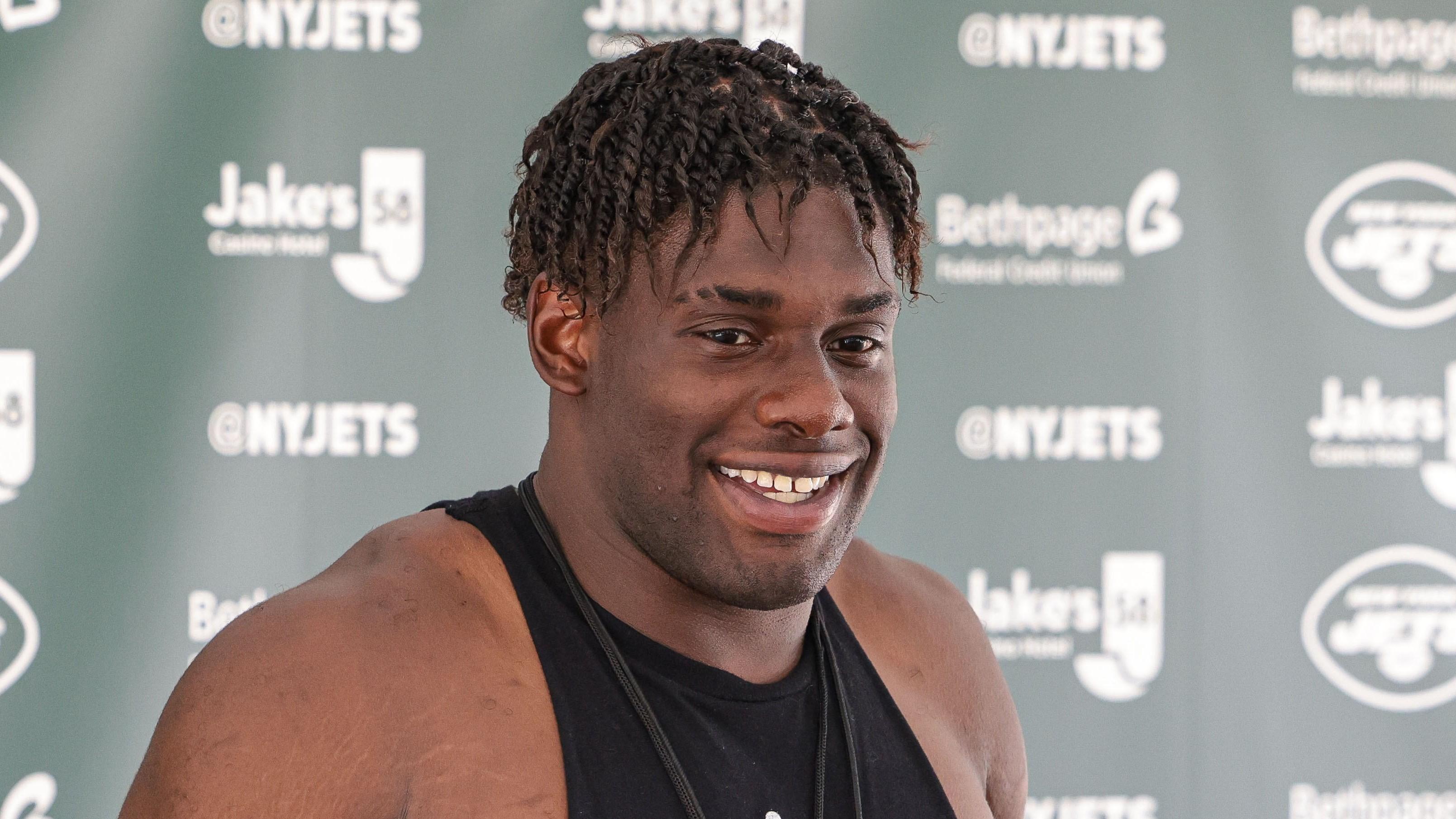 Caption: Jul 27, 2021; Florham Park, NJ, United States; New York Jets defensive end Carl Lawson (58) talks with the media on training camp report day at Atlantic Health Jets Training Center.