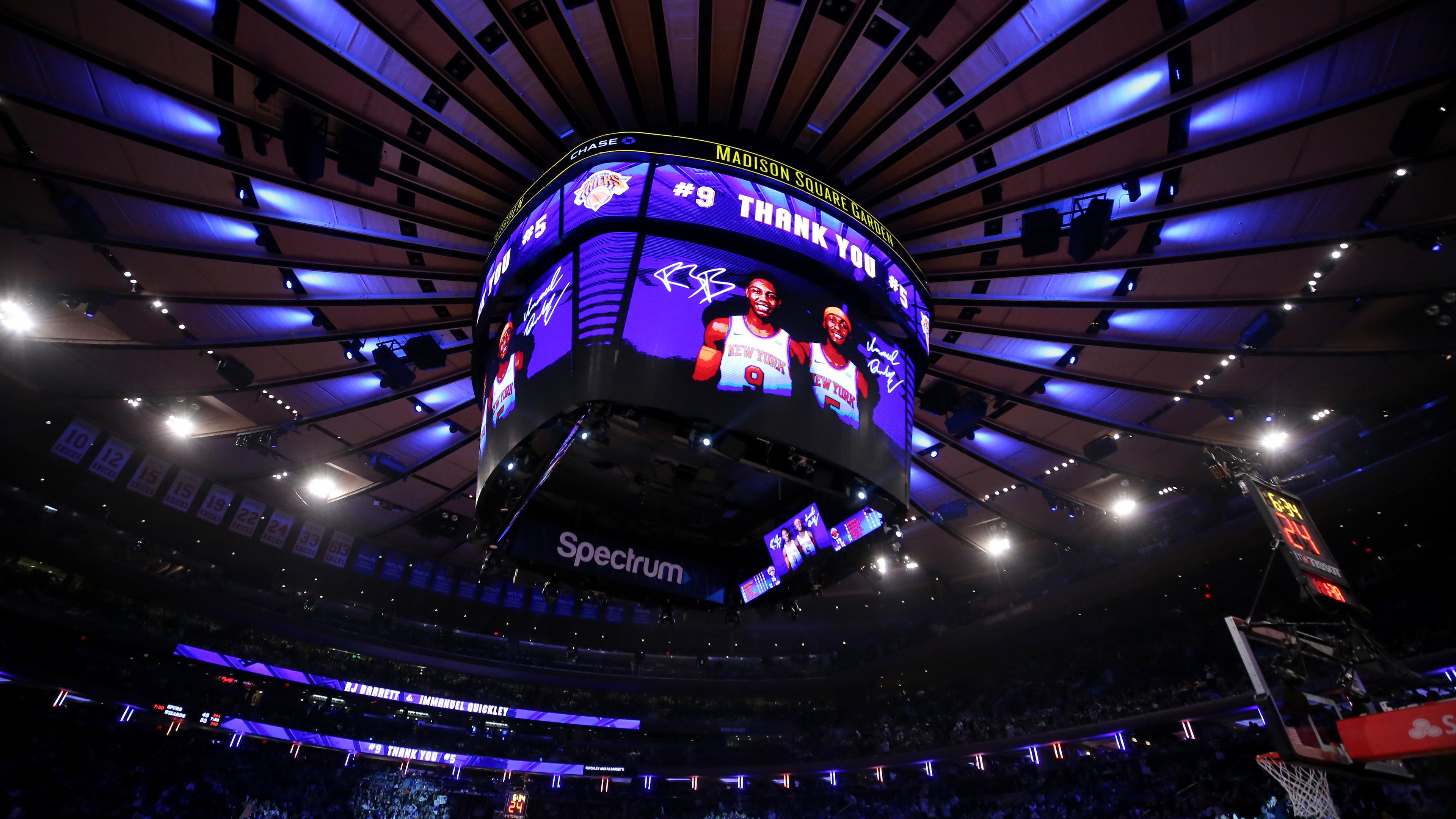 The New York Knicks honor Toronto Raptors guard RJ Barrett (9) and guard Immanuel Quickley (5) during the first quarter at Madison Square Garden.